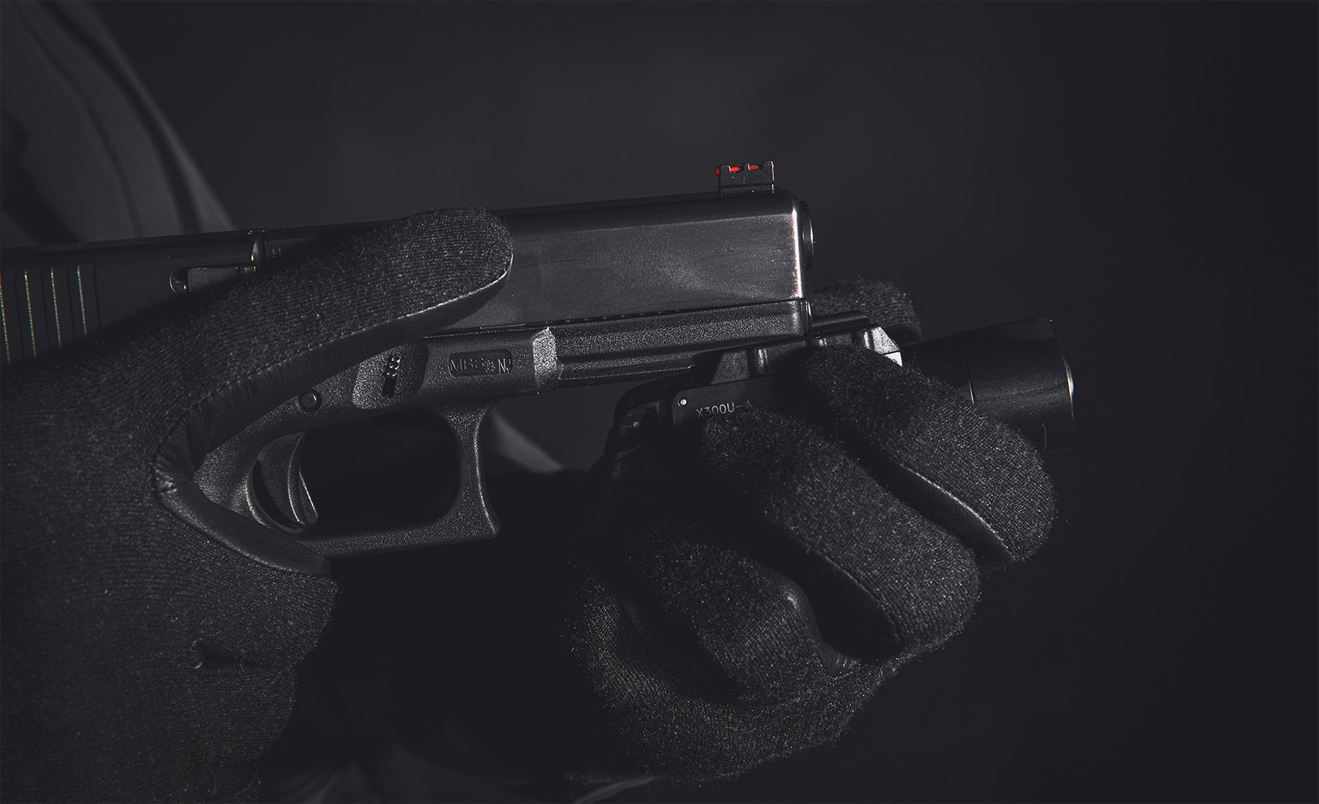Surefire X300-asevalon kiinnitys Glock-pistooliin