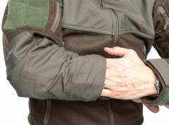 Särmä TST Woolshell-takki. Kyynärvahvikkeiden sisällä taskut suojainserteille. Kuvassa vihreä-ruskea (poistunut väri).