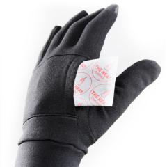The Heat Company kädenlämmitin. Samalla valmistajalla on hanskoja, joissa erilliset osastot lämmittimiä varten.