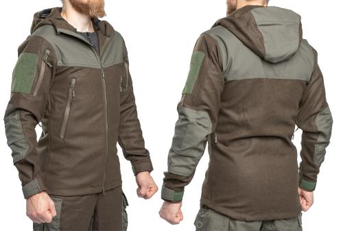 Särmä TST Woolshell-takki. Mallin koko Small-Medium Regular, päällä koko Small Regular. Kuvassa vihreä-ruskea (poistunut väri).