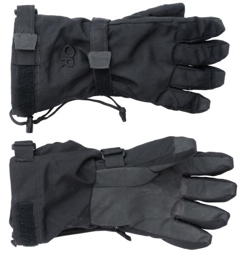 Outdoor Research Kodiak Gore-Tex-käsineet (EWDG), mustat, ylijäämä. Hansikkaissa on irroitettavat rannenyörit, joilla hanskat saa pysymään tallessa sorminäppäryyttä vaativien askareiden ajan.